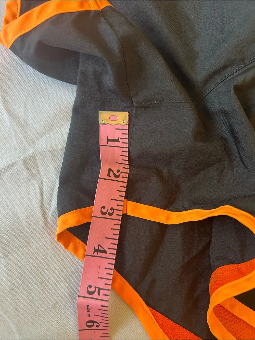 Nike Women’s Black and Orange Athletic Shorts